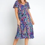 Brighton_Dress_Lava_Lamp_Print_5863_0083_Emma-2_8acb4ccd-aa2a-4b73-849c-e195a1561f42.webp