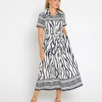 VLD31970_Border_Dress_Navy_271344x5_00ce988f-be83-4df0-b896-bc7121fa750b.webp