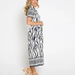 VLD31970_Border_Dress_Navy_271514x5_375fa520-2e72-4e19-b1e6-67fffc4bea89.webp
